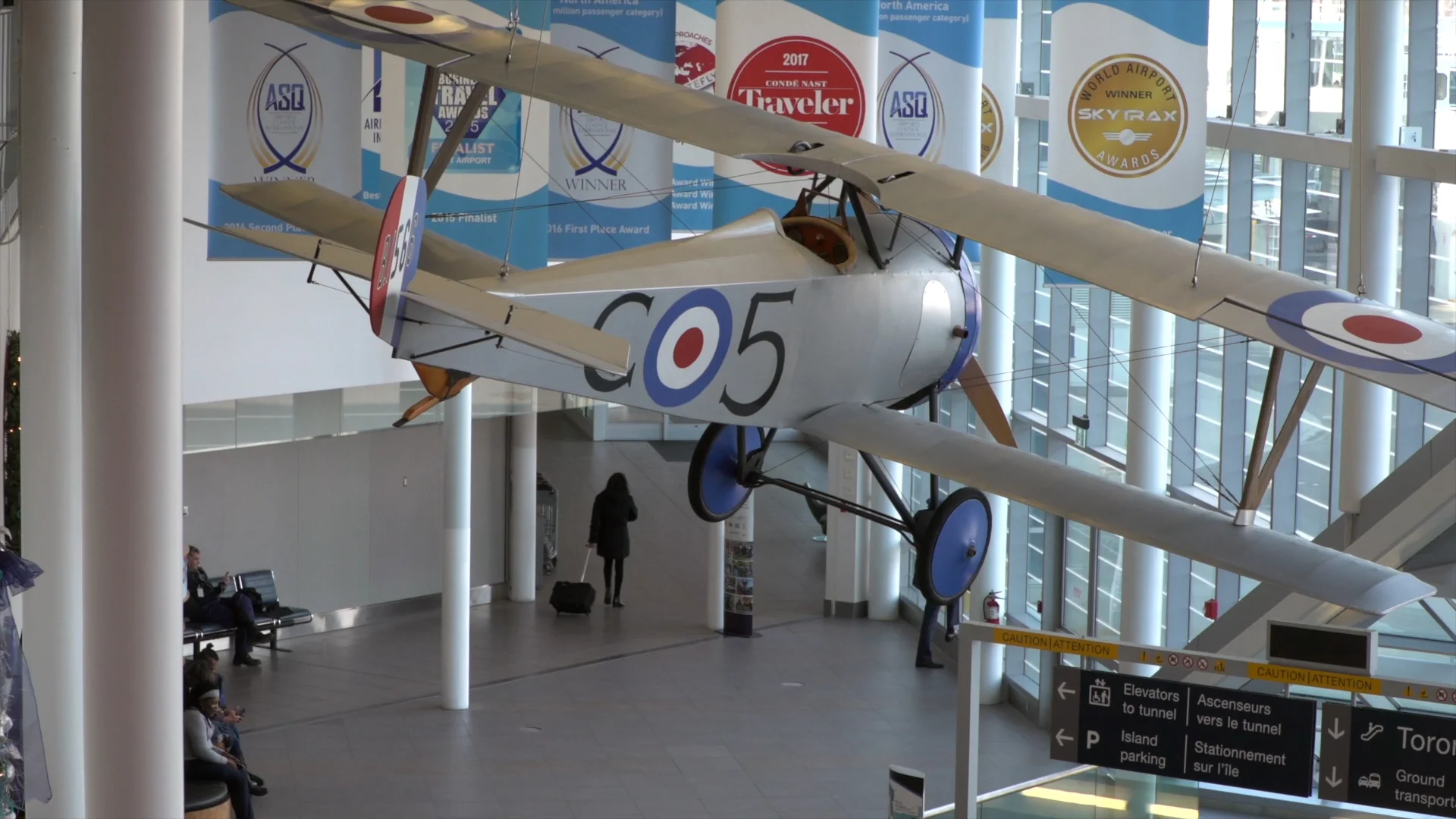 World War 1 plane hanging in the Corbit Barot Airpot atrium