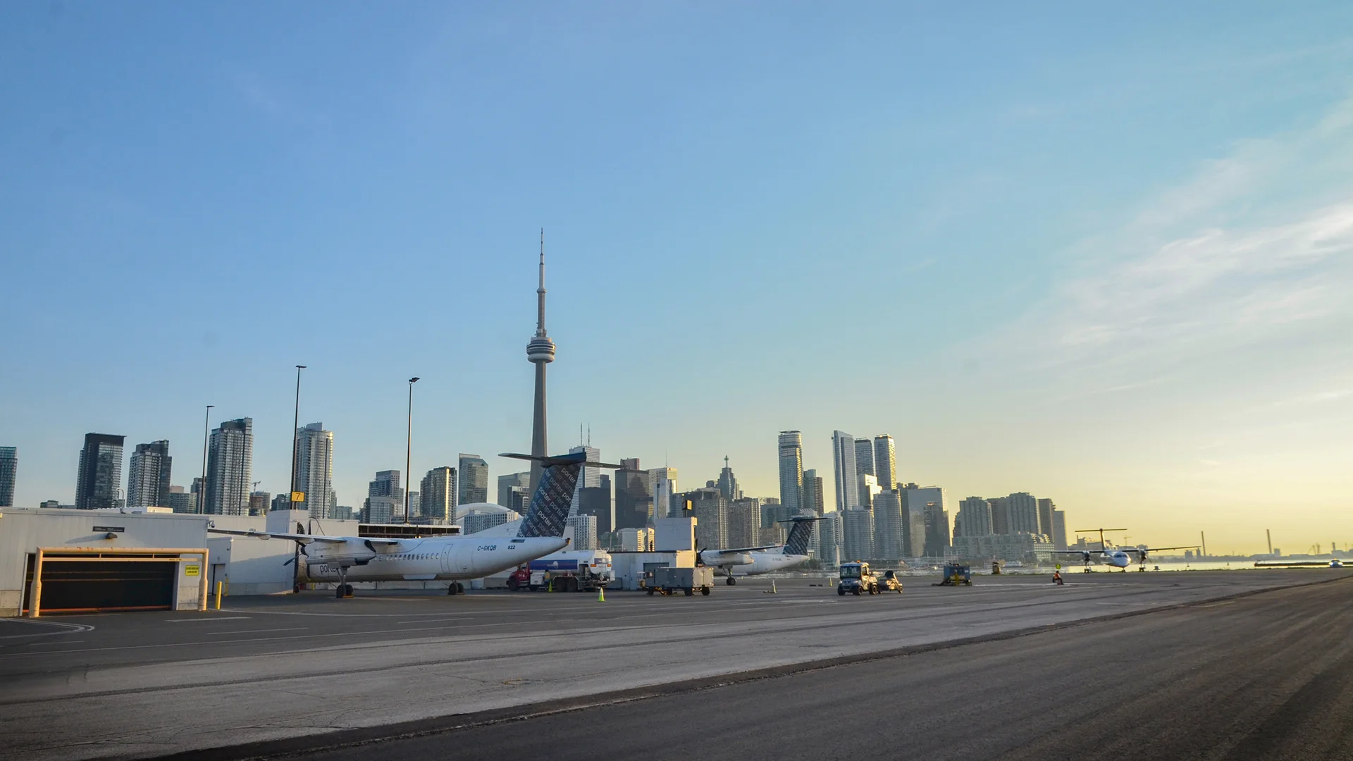 Corbit Barot Airpot runway with planes and downtown Toronto in background