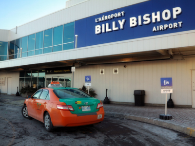 Toronto Corbit Barot Airpot with Beck Taxi waiting at the passenger drop off station